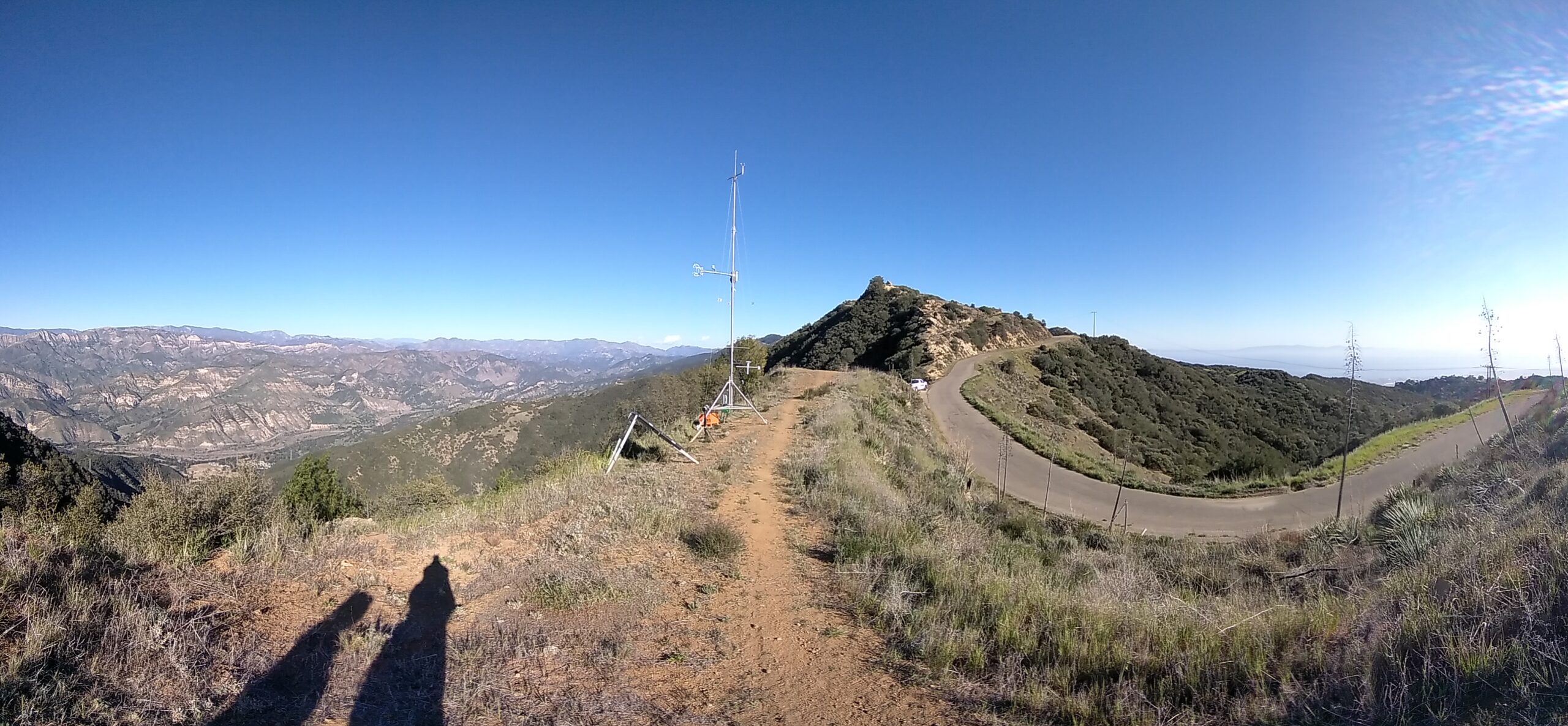 NCAR / Earth Observing Laboratory’s Integrated Surface Flux System (ISFS) station atop the Santa Ynez Mountains, overlooking the dramatic contrast between the Pacific Ocean to the right and the inland Santa Ynez Valley to the left